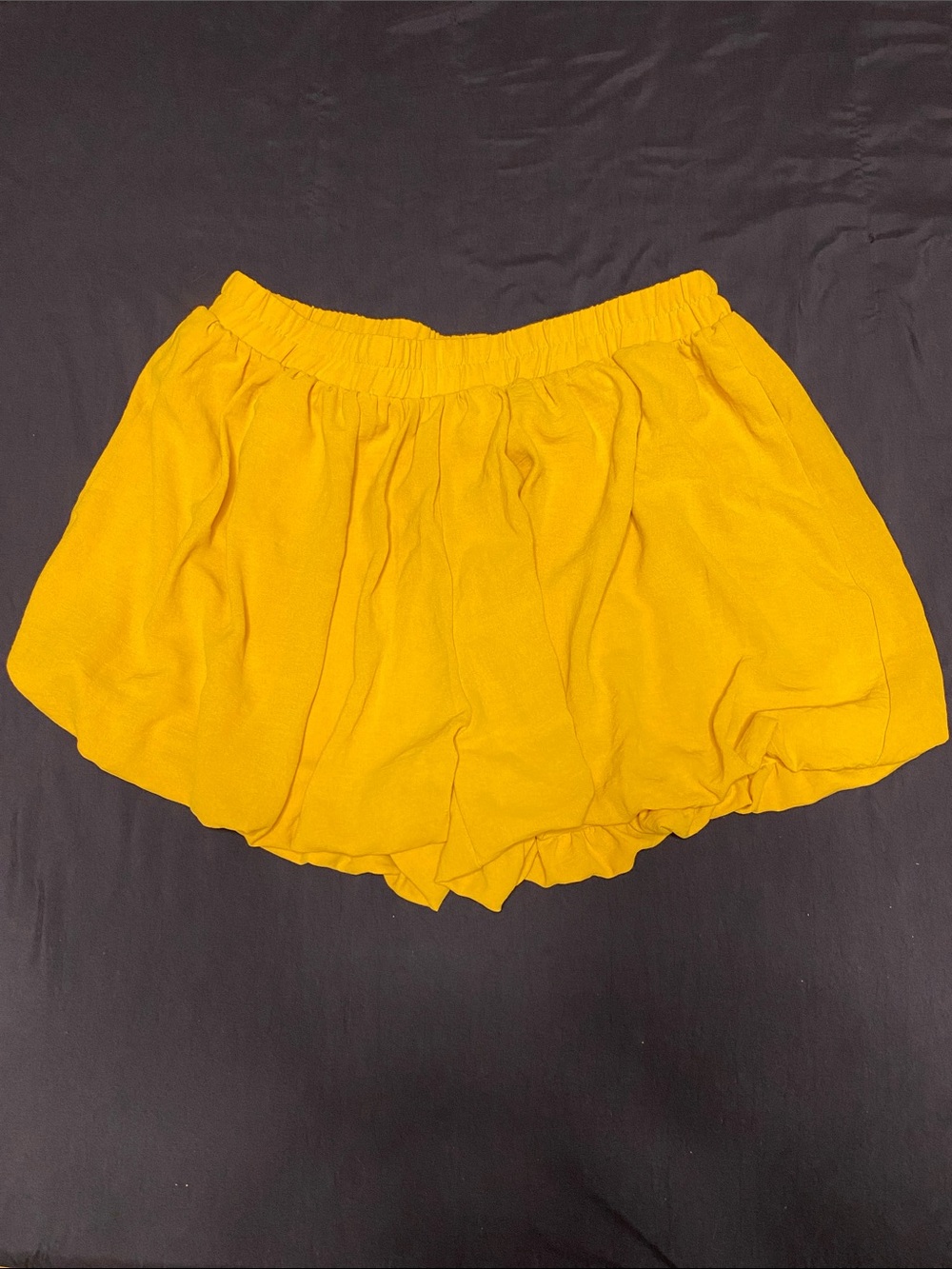 Yellow bubble shorts by AYIFU feature a high waist and a puffy, ruffled hem NWOT